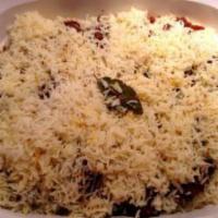 7. Lamb Biryani · Marinated lamb, herb and spices cooked with basmati rice.