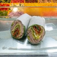 Smoked Turkey Wrap · Smoked turkey, choice of cheese, lettuce and tomato with choice of dressing.