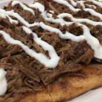 Pulled Beef Flat Bread · Pulled beef topped with garlic mayo.