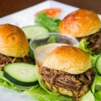 Pulled Beef Sliders (3pc) · Slider Buns Stuffed with pulled beef and shredded lettuce