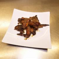 Jerk Wings (4-Whole) and 1 Side · Chicago's #1 Jerk Wings, marinated with Jamaican spices and Chef's distinct seasonings, then...