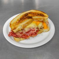 Hot Cornbeef Specialty · Comes with choice bread & cheese. Add-ons for an additional charge.
