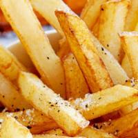 French Fries · Basket of seasoned, golden-brown fries served with ketchup or ranch.