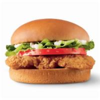 Crispy Chicken Sandwich Combo · A crispy chicken fillet topped with crisp chopped lettuce, thick-cut tomato, and mayo on a w...