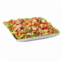 Crispy Chicken BLT Salad · Served with your choice of dressing and topped with crispy chicken, chopped tomatoes, crispy...