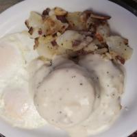 Chicken Fried Steak and Eggs · CFS with white gravy & a biscuit on top. Served with homefied potatoes and toast.