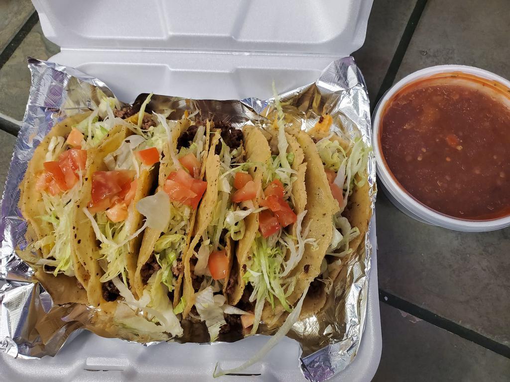 Beef Taco · 1 Fried shell ground beef taco with cheese, lettuce and salsa.