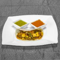 Rajas con Queso (jalapeños & cheese) · Sliced jalapenos mixed with onions, Corn and chopped queso fresco in a tomato sauce.