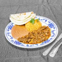 Lunch Plates · El guisado de su eleccion con frijoles, arroz y tortillas. Choice of meat from the menu, wit...