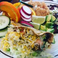 Combinacion de Dos · Choice of tamal, taco, hard shell, enchilada, taquitos o chile relleno. Served with rice and...