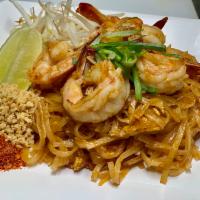 Pad Thai · The most popular stir-fried rice noodle dish with egg, tofu, onion, bean sprout, chive, pick...