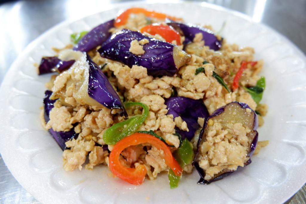 Eggplant Basil with Ground Chicken · Your choice of meat sauteed with garlic, eggplant, long hot chili, bell pepper and fresh basil in homemade sauce. Mild.