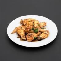 Thai Angel Wings · 10 pieces of wings deep fried then stir-fried with our house special sauce: garlic, green on...