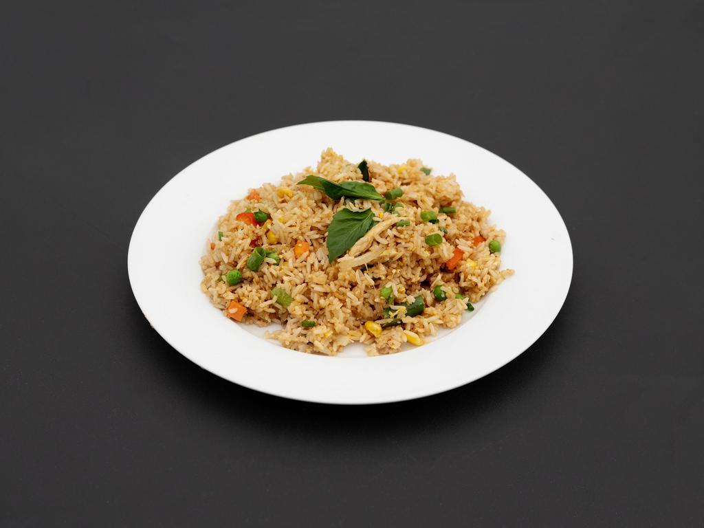 Basil Fried Rice · Stir-fried Jasmine rice, egg, green beans, bell peppers, carrots, basil, corn, garlic, yellow onions and basil. 