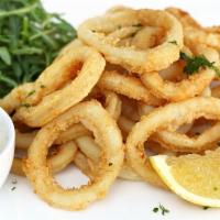 Fried Calamari · Calamari coated with seasoned flour and fried to perfection 
Served with: Cocktail Sauce