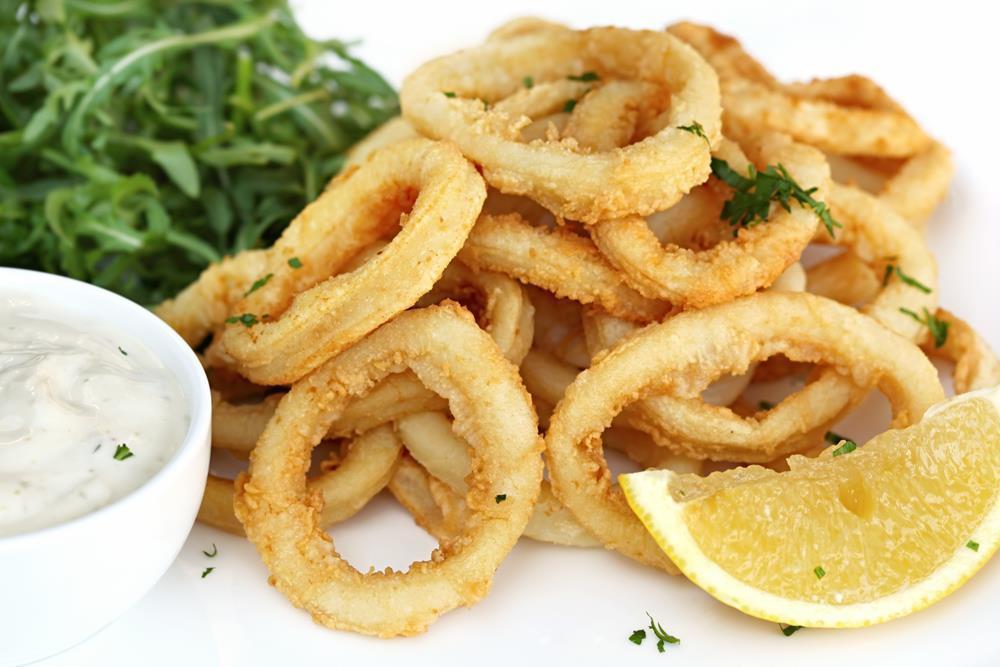 Fried Calamari · Calamari coated with seasoned flour and fried to perfection 
Served with: Cocktail Sauce