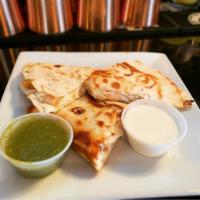 Quesadilla Mexicana  · Classic Tex Mex cheese quesadilla! Toasted flour tortilla with melted cheese, tomatoes, onio...
