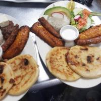 Pupusa Combination · 2 pupusas. Rice, beans, sweet plantain, sausages and sour cream.