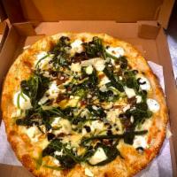 Special White Pizza · Caramelized onion, roasted garlic, spinach, black olives, ricotta, and mozzarella.
