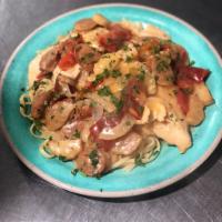 Chicken Scarpariello · Chicken breast sauteed in a white wine sauce with hot peppers, onions, sausage, and potato. ...