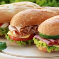 1. The Godfather Sandwich · Ham, Genoa salami, pepperoni, provolone, lettuce, tomatoes, oil and vinegar.