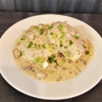 Biscuits with Bacon Sausage Gravy Breakfast · 2 of our fluffy house-made buttermilk biscuits smothered with our creamy sausage and bacon g...