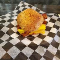 Biscuit Breakfast Sandwich · A house-made green onion cheddar buttermilk biscuit, layered with eggs, and your choice of s...