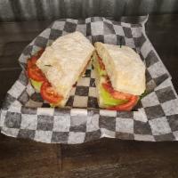 BLT Sandwich · Thick cut bacon, romaine lettuce, and fresh tomato. Dry unless mayo or mustard requested.