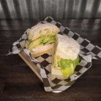 Southwest Turkey Sandwich · Oven-roasted all-natural turkey, chipotle mayo, avocado, provolone, romaine, and cucumber.