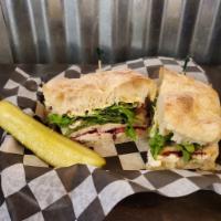 Thanksgiving Classic Sandwich · Oven-roasted all-natural turkey, herbed cream cheese, mixed greens, and creamy Dijon-style m...