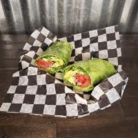 Vegan Delight Wrap · Spinach wrap, hummus, cucumbers, tomato, spinach, avocado, pickled red onion, and fresh crac...