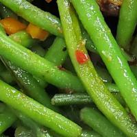 Green Beans · Sauteed with an olive oil butter blend, salt, pepper, and fresh garlic.