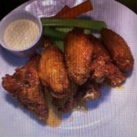 Honey Sriracha Chicken Wings  · Carrots, celery, and blue cheese.