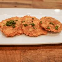 Tostones (Fried Green Plaintains) · Green Plantains fried, pressed, refried and seasoned with Pink Himalayan Salt