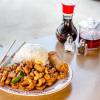 Dinner Cashew Chicken · Served with your choice of rice, veggies or lo mein and your choice of egg roll, cheese rang...