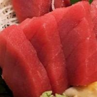 Tekka Don · 12 pieces of tuna sashimi over a bowl of steamed sushi rice.