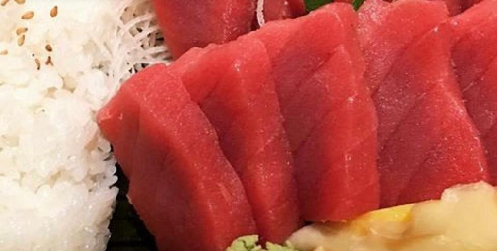 Tekka Don · 12 pieces of tuna sashimi over a bowl of steamed sushi rice.