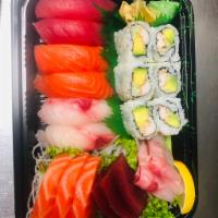 Sushi and Sashimi Combo · 6 pieces of sushi, 8 pieces of sashimi and a California roll.