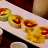 Manhattan Naruto Roll · Tuna, salmon, yellowtail, shrimp, avocado, mango, caviar and ponzu sauce.
