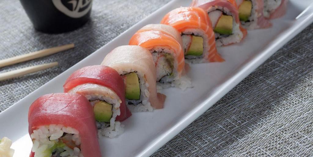 Rainbow Roll · Kani and avocado with assorted sashimi on top.