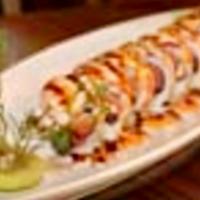 Akimoto Sushi Special Roll · Tuna, salmon, yellowtail, asparagus wrapped with seared salmon, tuna, yellowtail and eel sau...