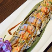 Fire Roll · Crab meat, white fish, tamago, asparagus, tobiko tempura with spicy mayo and eel sauce.