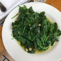 Spinach · Sauteed spinach in garlic and olive oil.