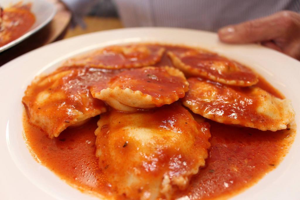 Cheese Ravioli · Cheese ravioli in tomato sauce.