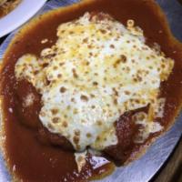 Chicken Parmigiana Entree · Chicken cutlet in marinara sauce baked with mozzarella. Free range and antibiotic free. Serv...