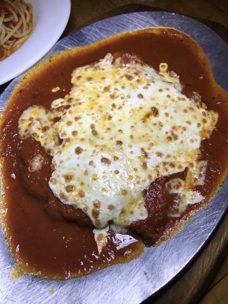 Chicken Parmigiana Entree · Chicken cutlet in marinara sauce baked with mozzarella. Free range and antibiotic free. Served with choice of salad or pasta.