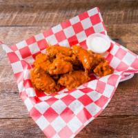 Chicken Wings · Cooked wing of a chicken coated in sauce or seasoning.