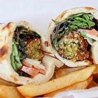 Falafel  · The famous Middle Eastern Falafel, homemade and served with tahini sauce, tomato, lettuce, o...