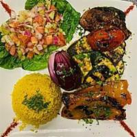 Veggie Kebab · Carefully chosen vegetables grilled and seasoned with fresh lemon and olive oil, then served...