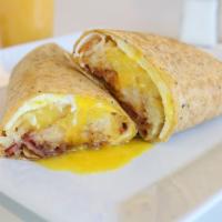 Classic Breakfast Burrito · Choice of ham, bacon, sausage, gyro meat, or morning star veggie sausage. 1 choice of cheese...